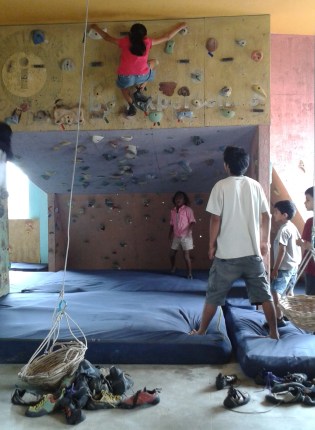 Janani climbing at the mini-gym.