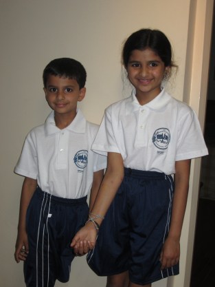 Janani and Sajjan in their PE Uniforms.  They only have uniforms for PE, not for the school day.