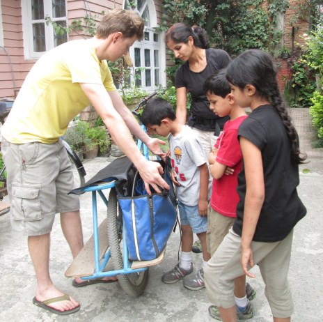The panniers can hold an amazing amount!  Toss the groceries inside and the kids on top and you are off!