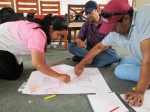 Colleagues enthusiastically working on a team-building activity at our retreat