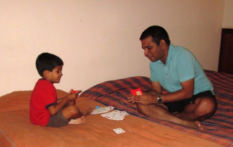 Sumi beating Dinesh in a game of Blink!