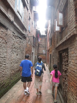 Walking down a narrow alley in Bhaktapur.