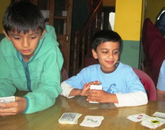 Dan and Sajjan playing the Mille Bourne card game