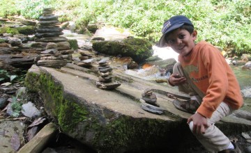 Sumanth next to the cairn he built
