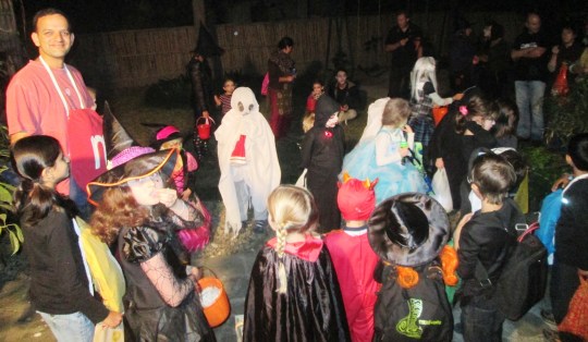 Prakash leading the skeletons, goblins, ghosts and witches through the song, Have You Ever Seen a Pumpkin.  We learned this song years ago at the West Regional Library in Cary, North Carolina and remember it fondly each Halloween.