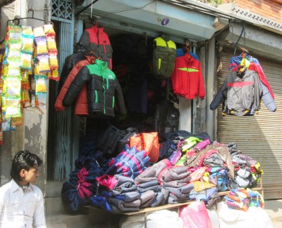 Puffer jackets, and anything you can imagine made from fleece or wool -- jumpers / sweaters, shawls, scarfs, hats, gloves, wrist warmers, leg warmers, socks, pants... the list goes on and on...