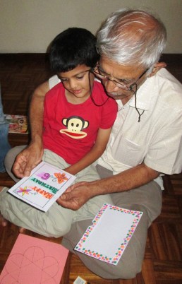 As you removed the black and white card from its sleeve, color magically appeared!  Tricky illusion using 1 clear sheet and a few plain papers.